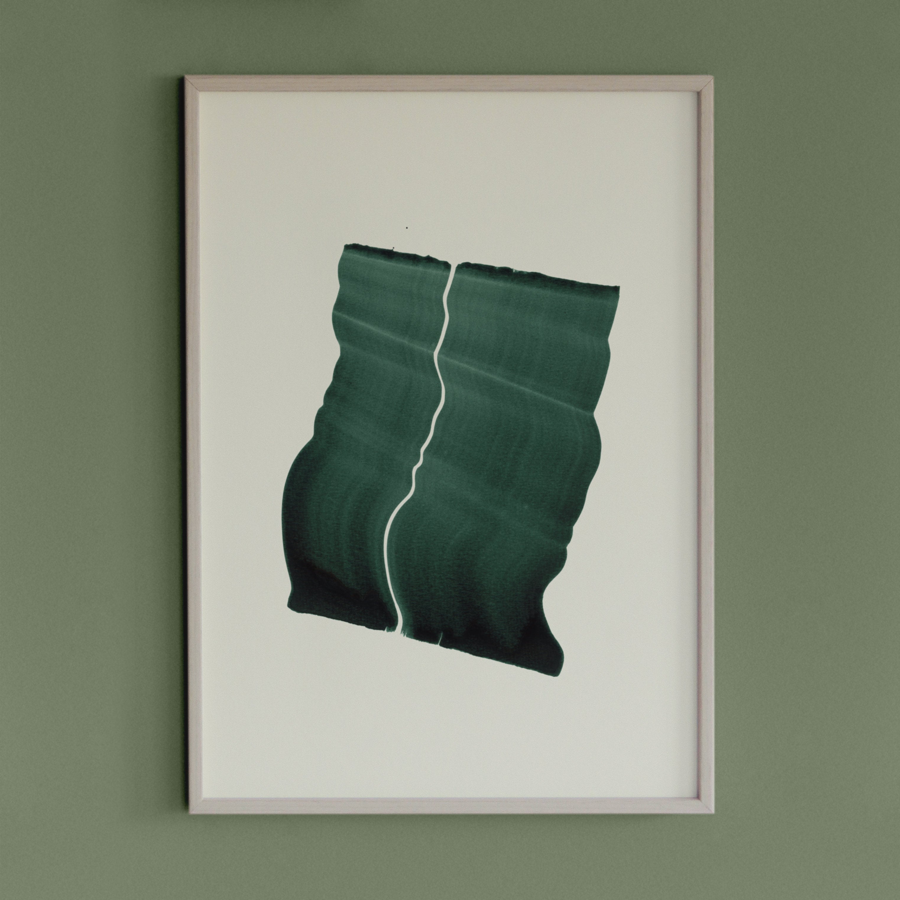 Deep green wavy abstract artwork in a thin white oak wooden frame on a sage green wall