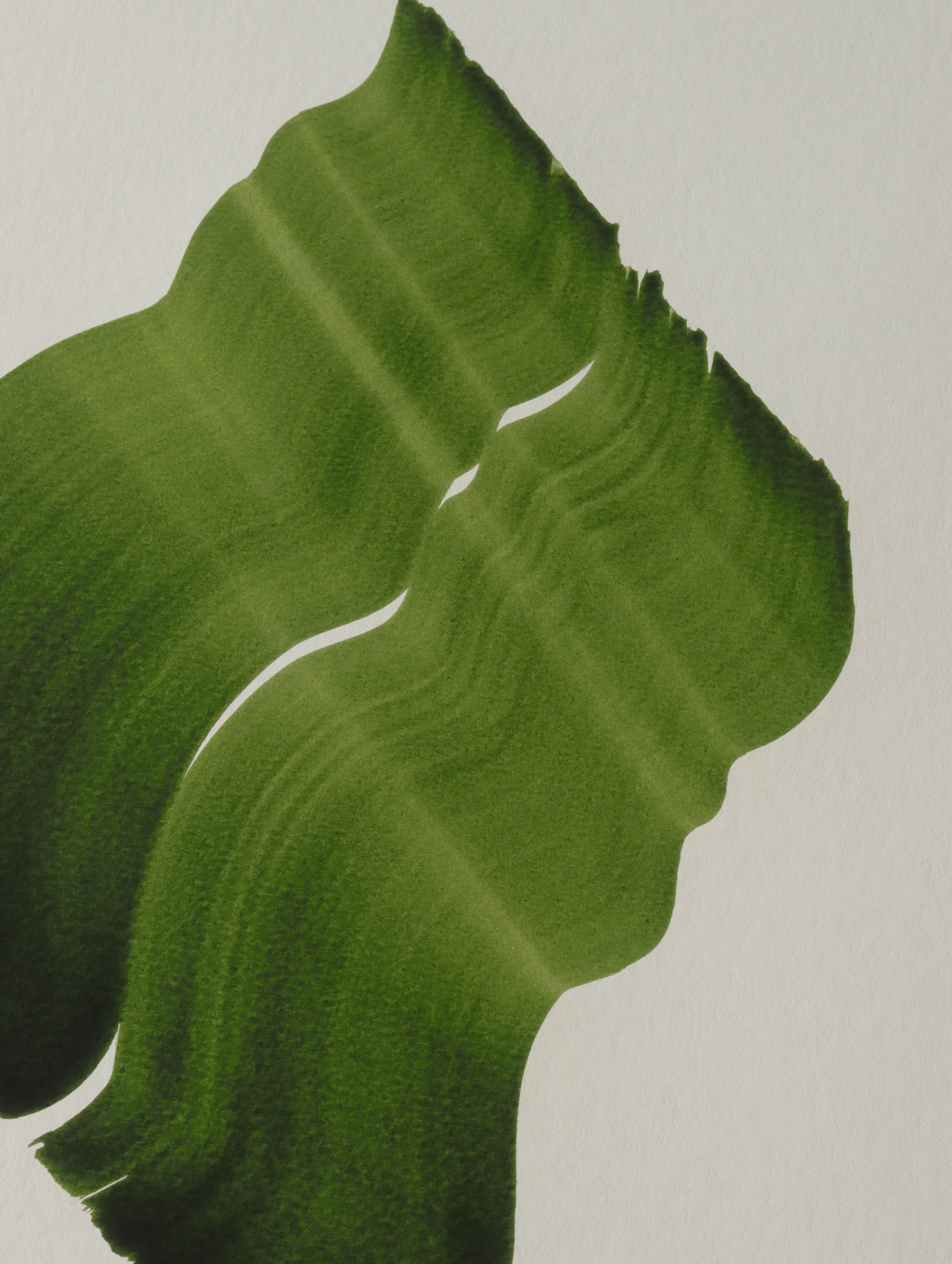Green abstract painting, fine art print. Close-up detail shot of the high quality print, the textured bamboo paper, the curved shape and pattern, vibrant colours and fine detail.