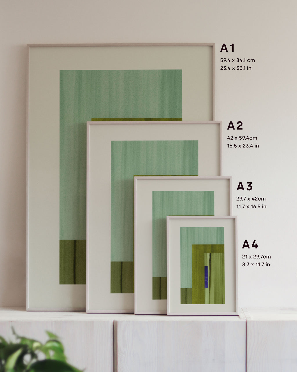 Framed geometric abstract art prints on a neutral background, showing in sizes A4, A3, A2 and A1.