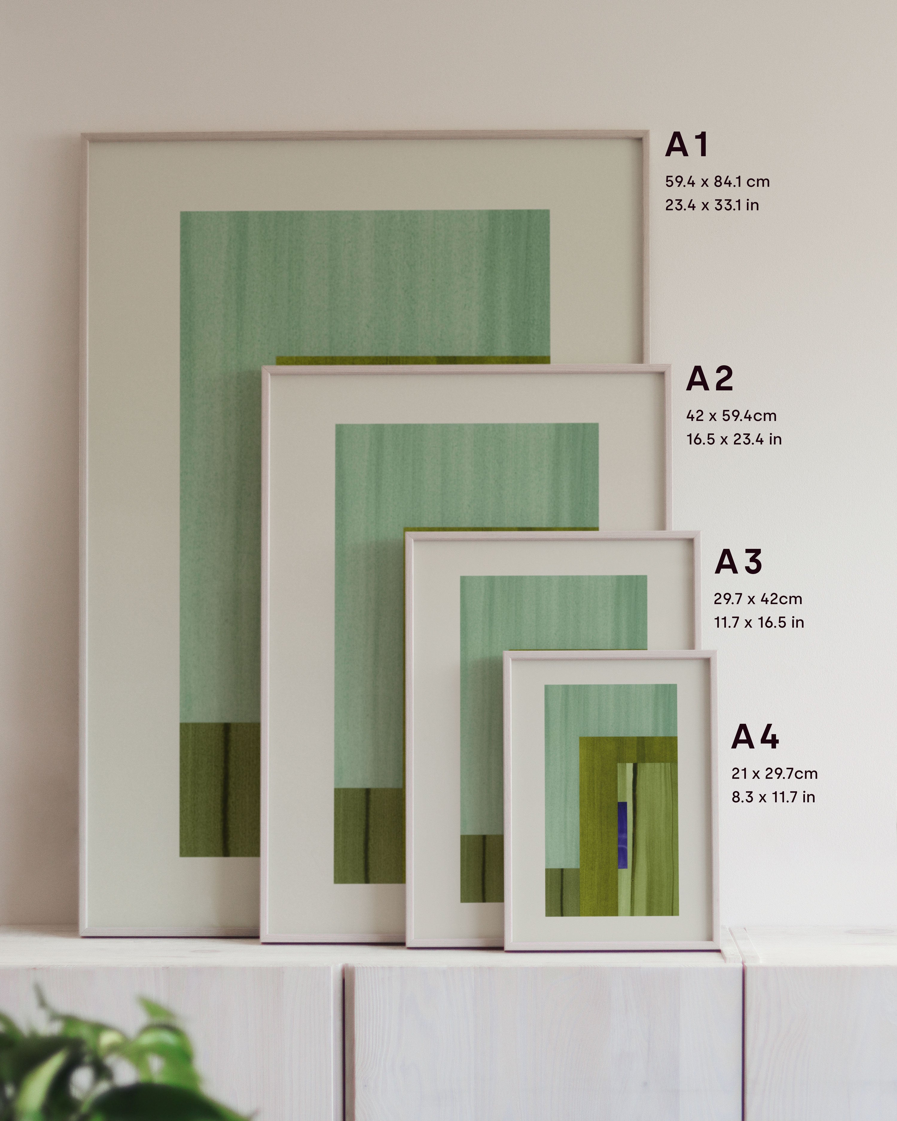 Framed geometric abstract art prints on a neutral background, showing in sizes A4, A3, A2 and A1.