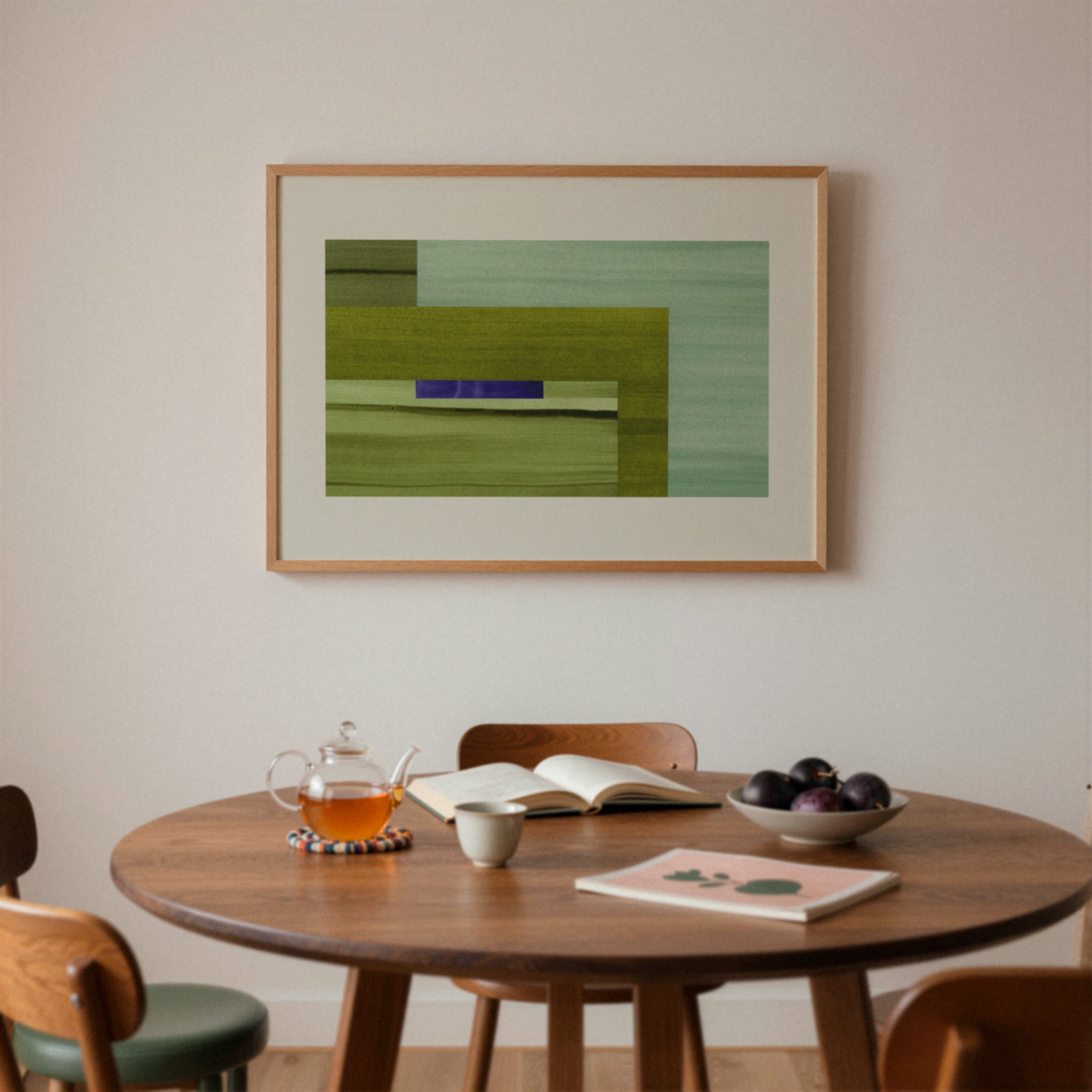 Mid century dining room with a wooden table, chairs, and a framed abstract artwork on the wall.