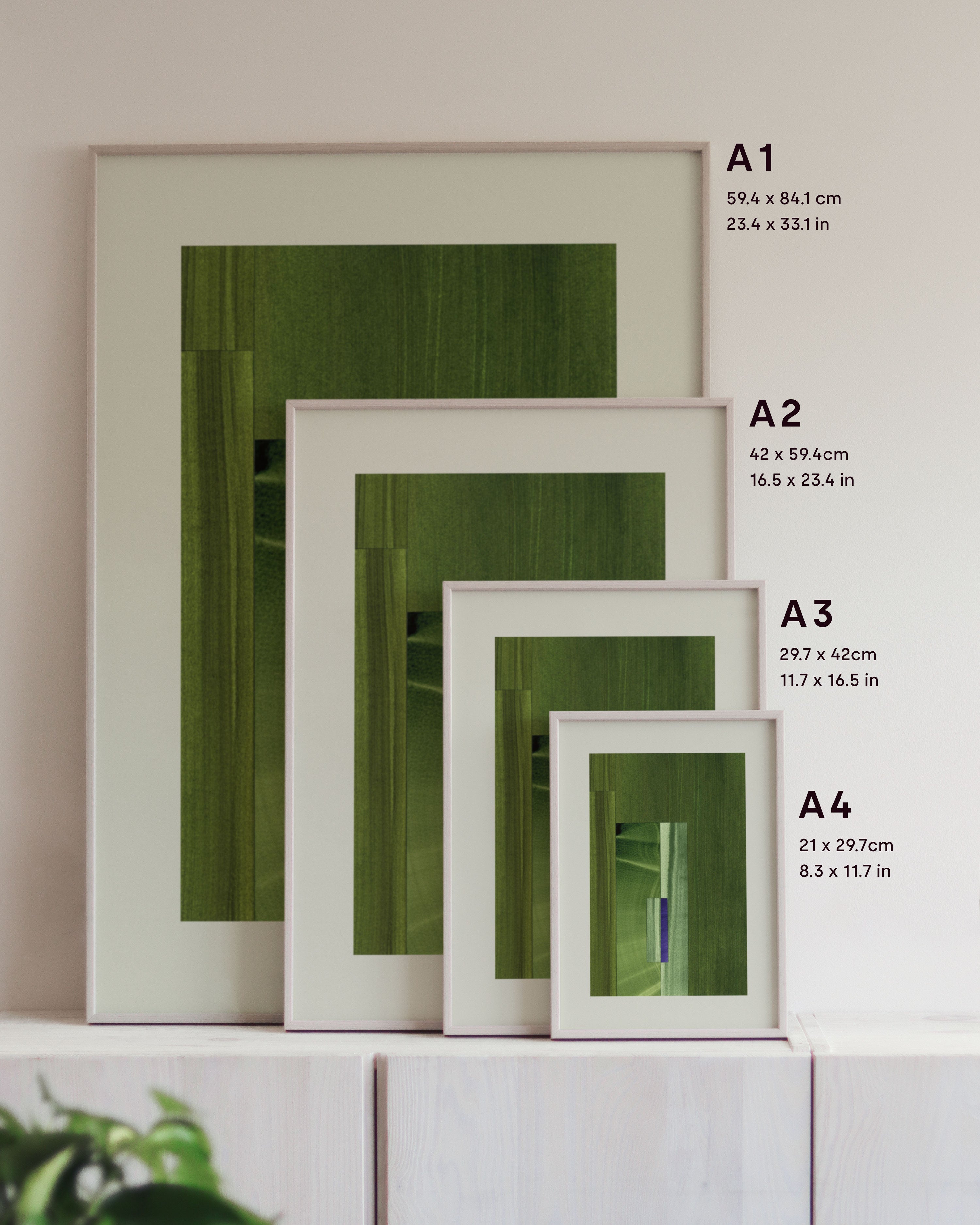 Framed green abstract art prints on a neutral background, showing in sizes A4, A3, A2 and A1.