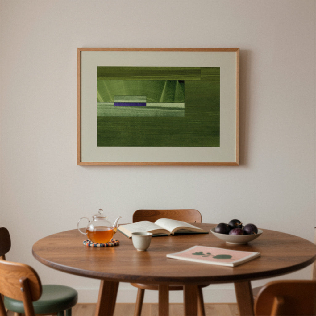 Mid century dining room with a wooden table, chairs, and a framed green abstract artwork on the wall.
