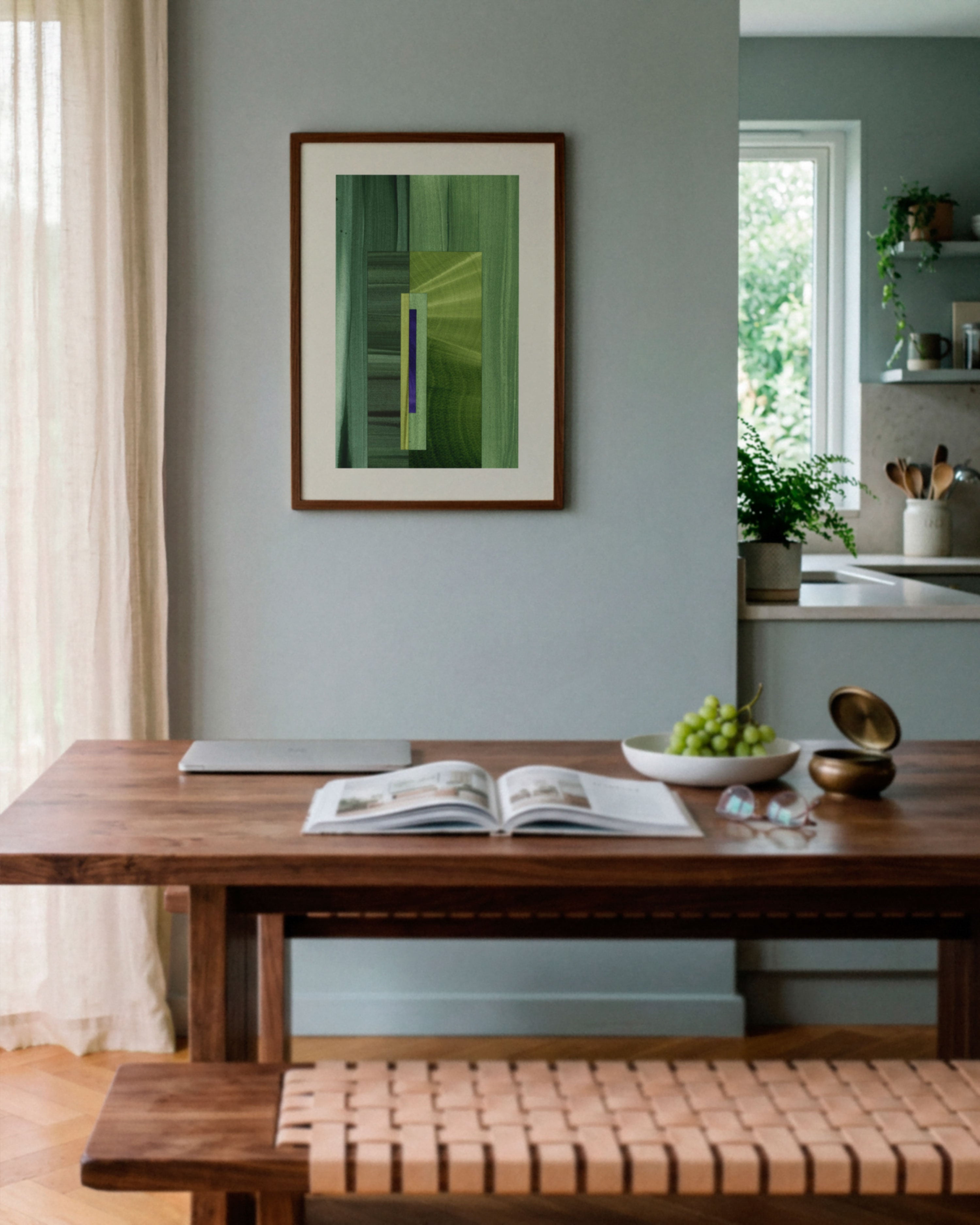 Sky blue dining room with walnut wooden table, and green abstract art on the wall.