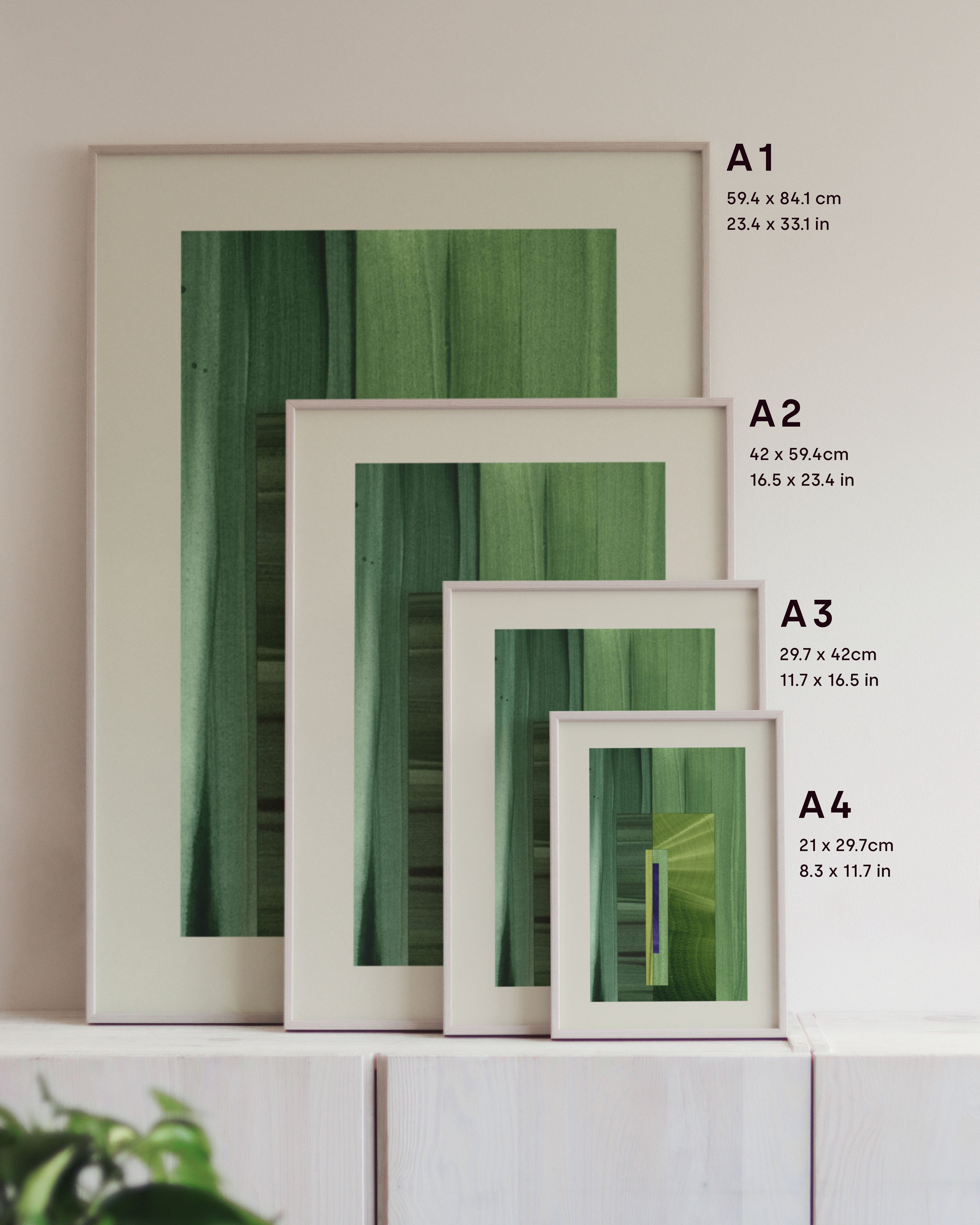 Framed green abstract art prints on a neutral background, showing in sizes A4, A3, A2 and A1.