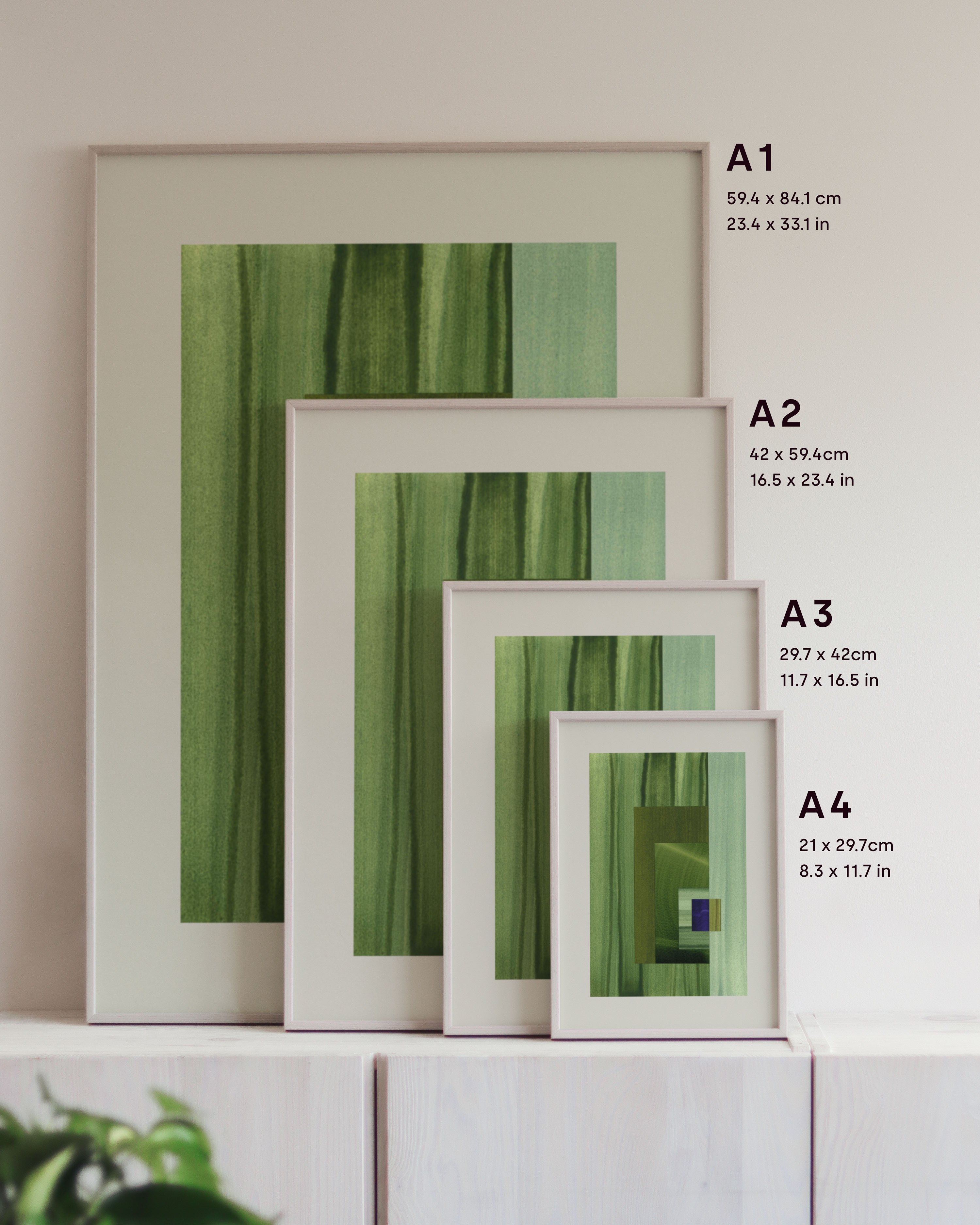 Framed green abstract art prints on a neutral background, showing in sizes A4, A3, A2 and A1.