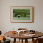 Mid century dining room with a wooden table, chairs, and a framed green abstract artwork on the wall.