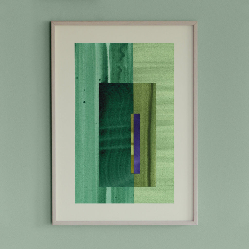 Framed geometric abstract art piece with turquoise, mint green and blue colours on a light green wall.