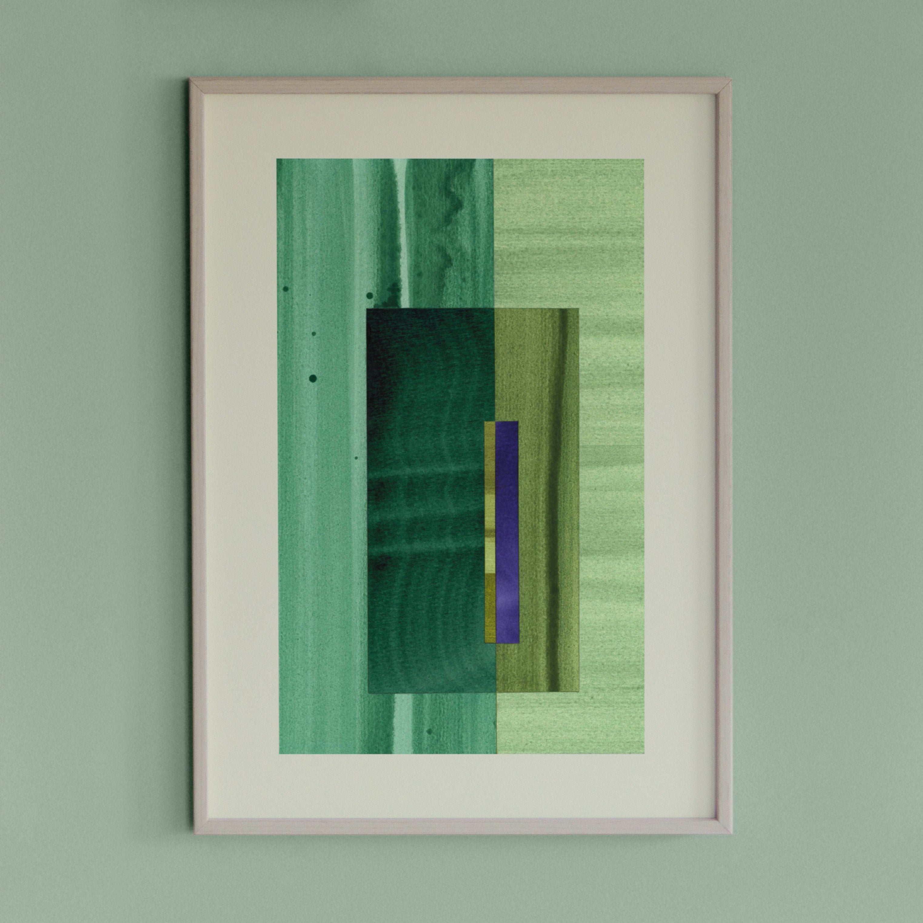 Framed geometric abstract art piece with turquoise, mint green and blue colours on a light green wall.