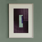 Geometric abstract artwork with aubergine purple, turquoise and royal blue colours, in a thin white oak wooden frame on a teal/aquamarine grey wall