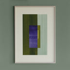 Geometric abstract artwork with olive green and blue/purple colours, in a thin white oak wooden frame on a teal/aquamarine grey wall