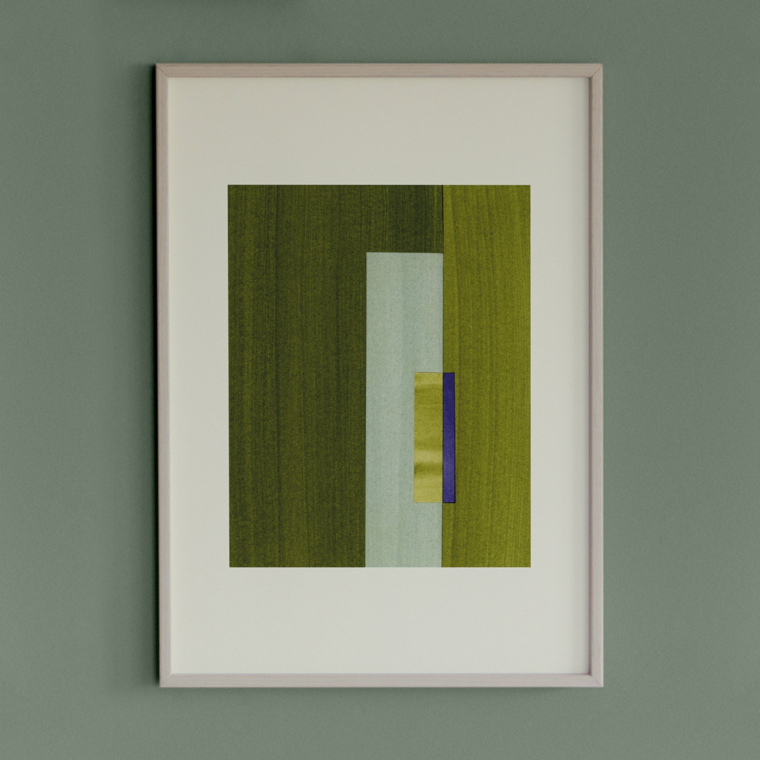 Geometric abstract artwork with green and blue/purple colours, in a thin white oak wooden frame on a teal/aquamarine grey wall