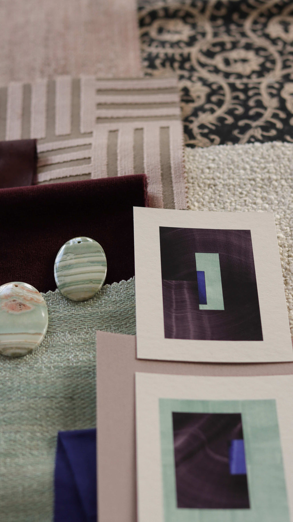 Turquoise and deep eggplant purple geometric abstract art print samples with fabric swatches. Inspiration for pink, mint and dark rust themed interior design.