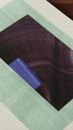 Geometric abstract artwork, fine art print. Close-up detail shot of abstract artwork with rectangular shapes in a light turquoise aqua green, deep purple and royal blue. On cream textured bamboo paper, showcasing the high quality and fine details.