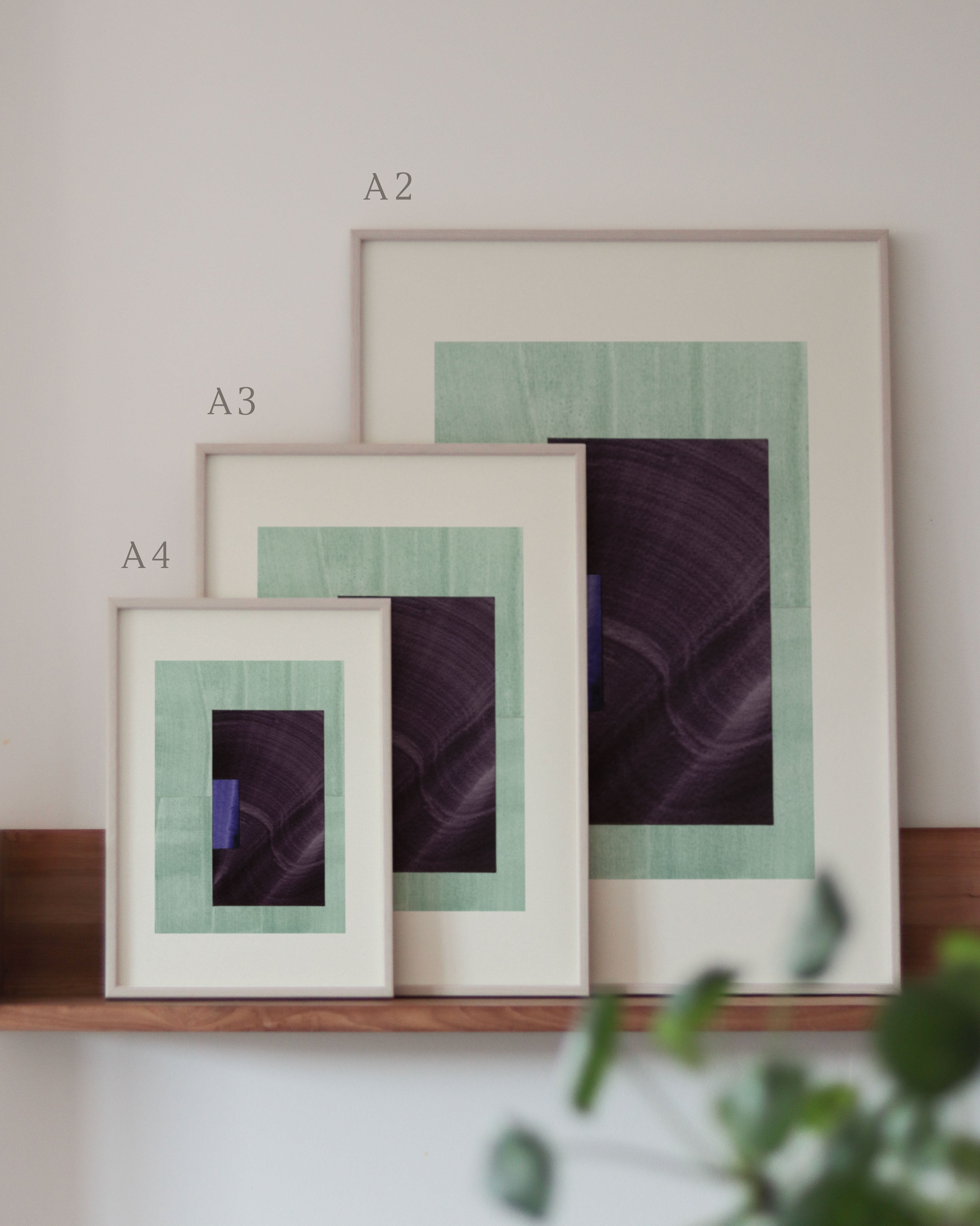 Set of turquoise and eggplant purple framed geometric abstract art prints on a neutral background, showing in sizes A4, A3, and A2