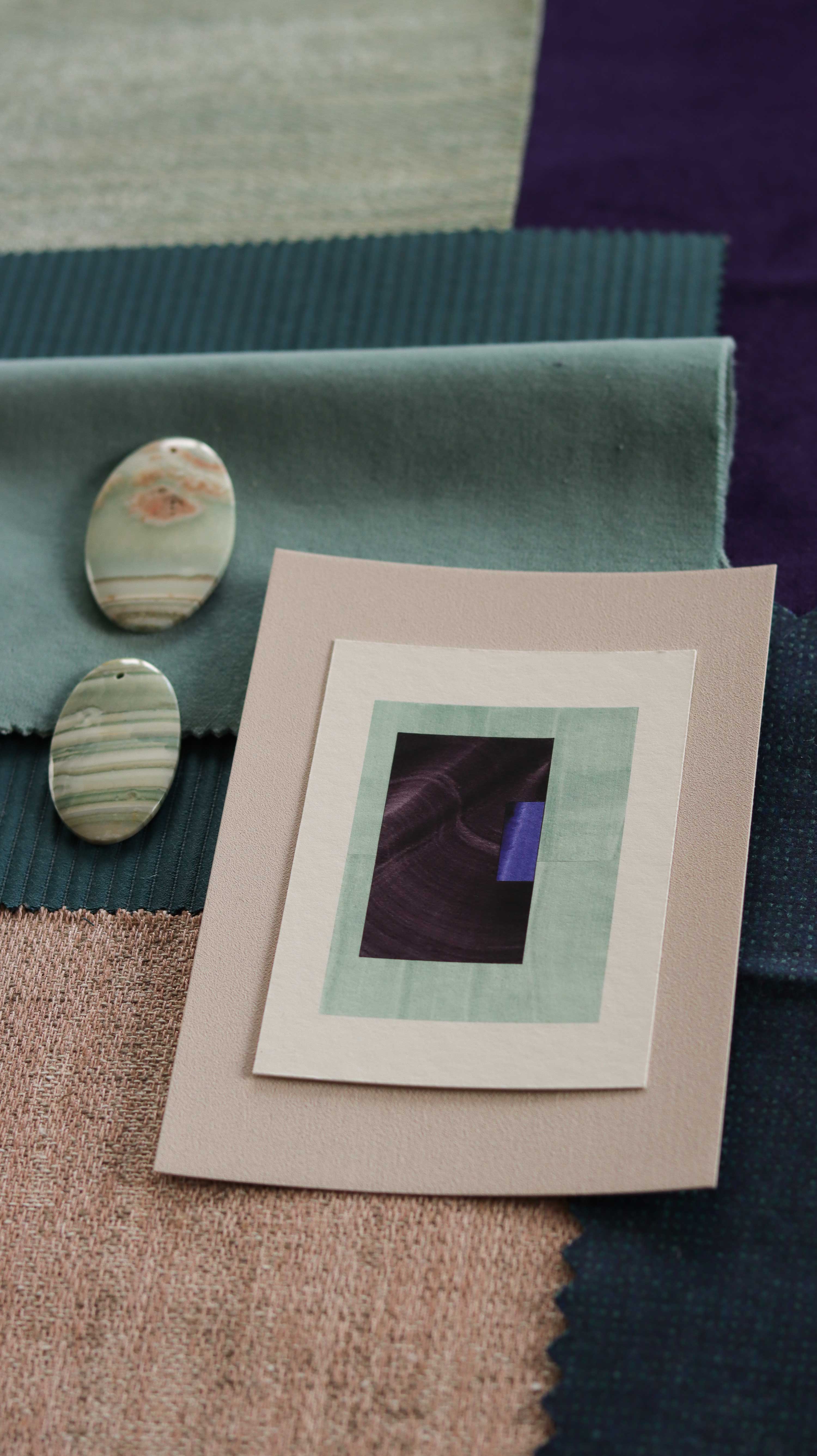 Turquoise and deep eggplant/aubergine purple geometric abstract art print samples with fabric swatches. Inspiration for teal and pink themed interior decor.