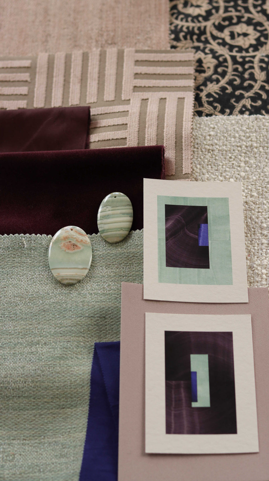Turquoise and deep aubergine purple geometric abstract art print samples with fabric swatches. Inspiration for pink, mint and deep rust themed interior decor.