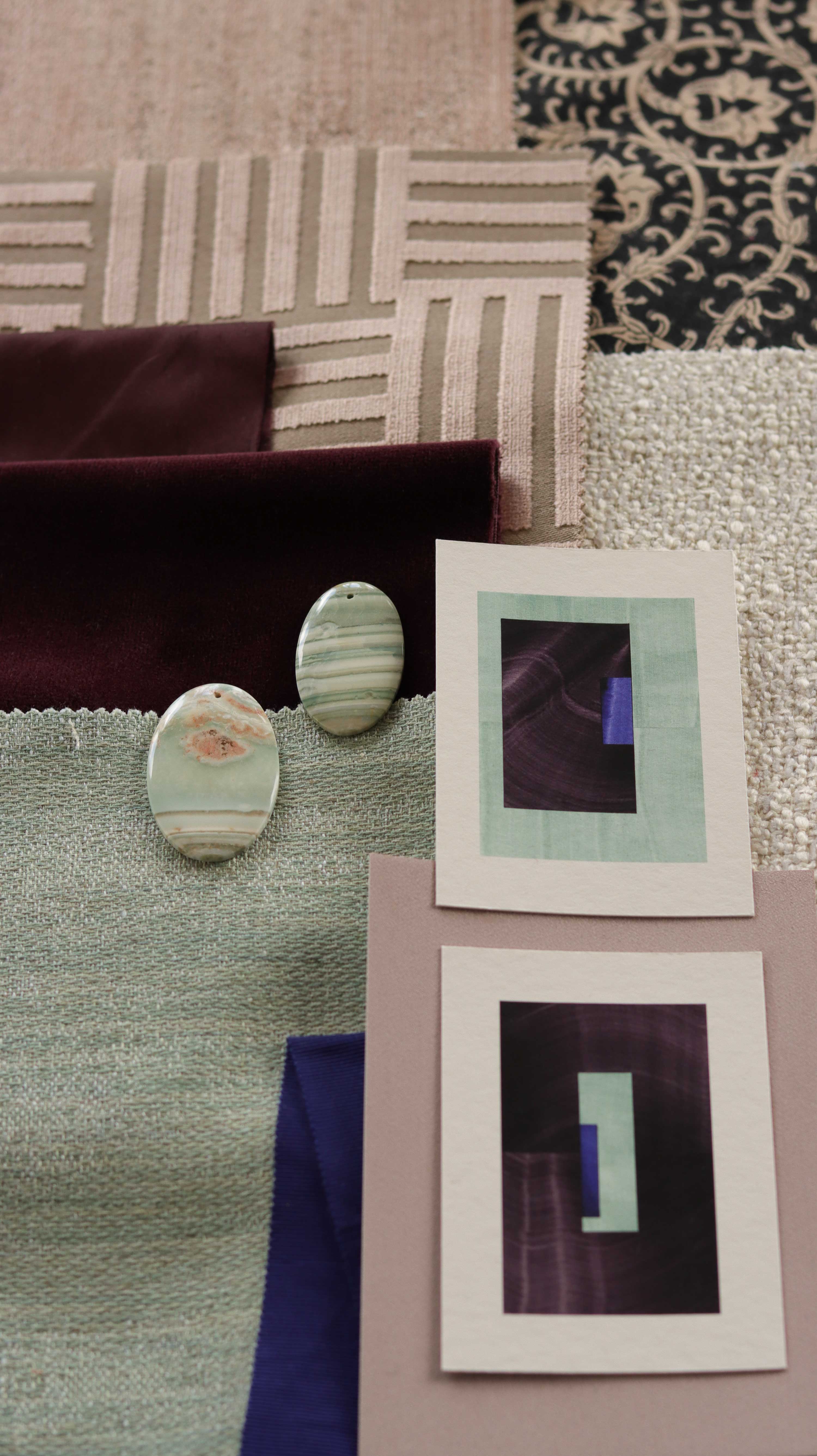 Turquoise and deep aubergine purple geometric abstract art print samples with fabric swatches. Inspiration for pink, mint and deep rust themed interior decor.
